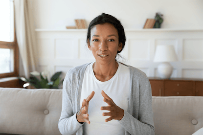 Photo of woman presenting with confidence