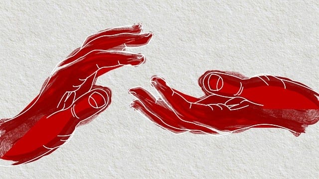 hands reaching for each other