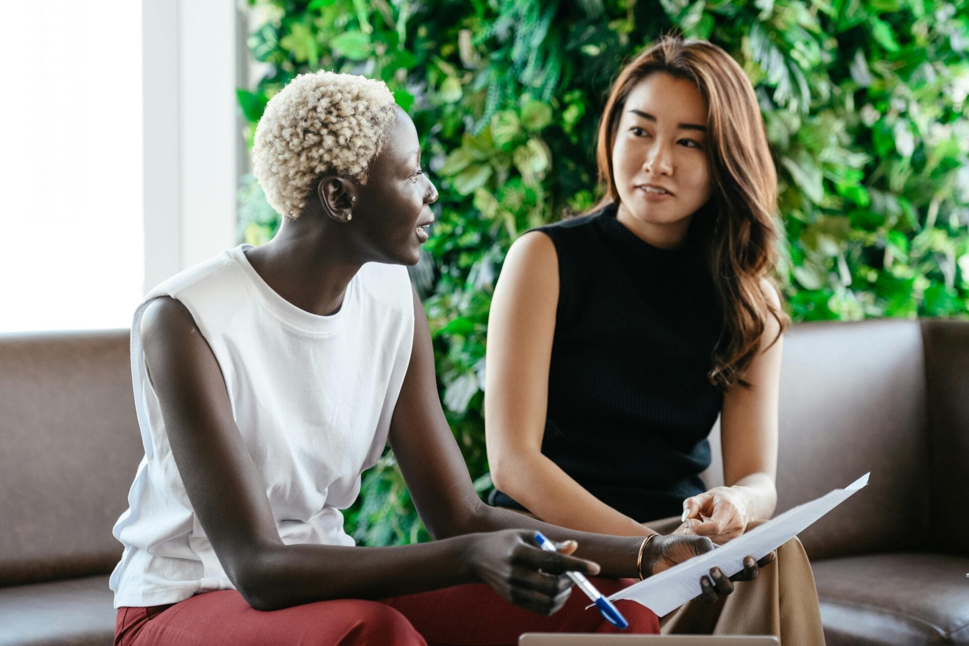 two women talking assertively